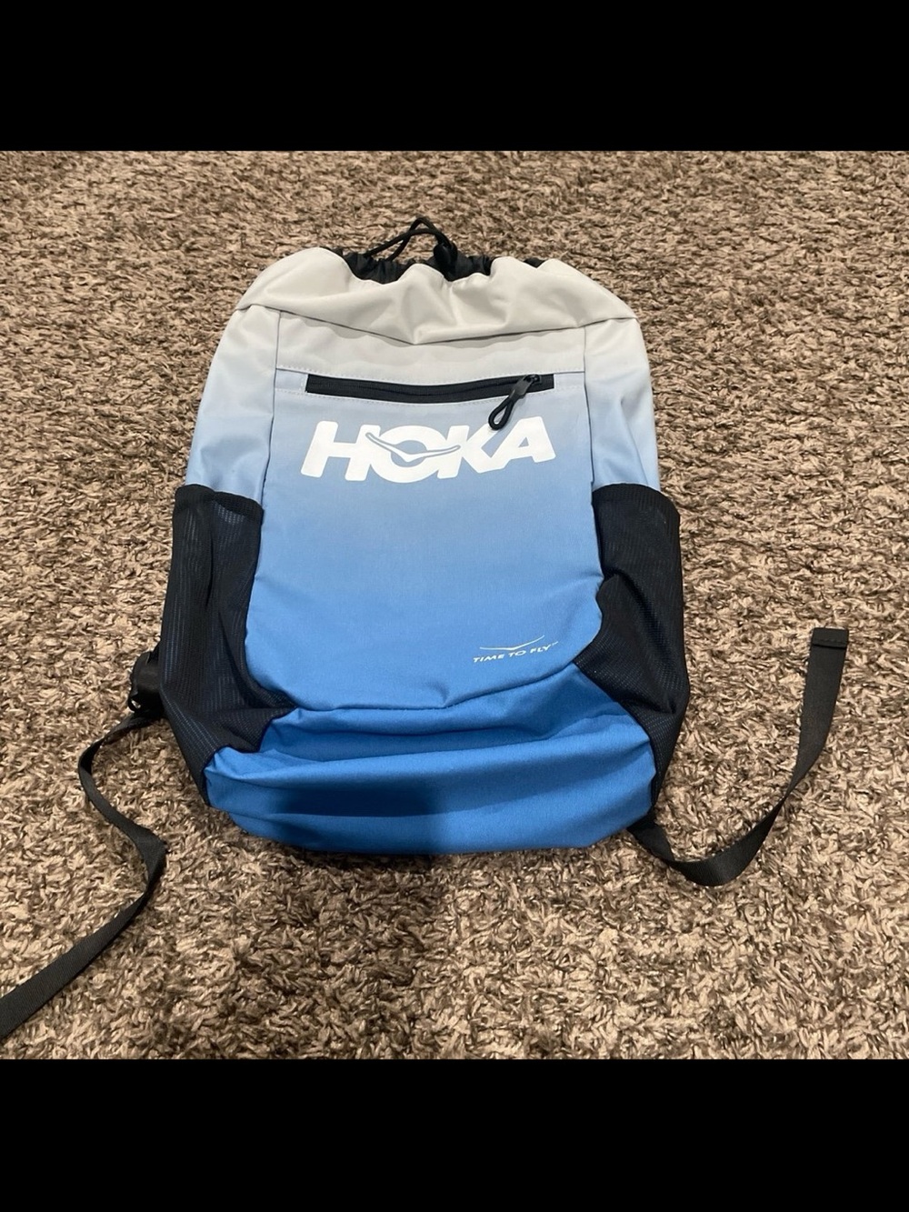 Hoka gradient, blue drawstring, backpack/shoe bag